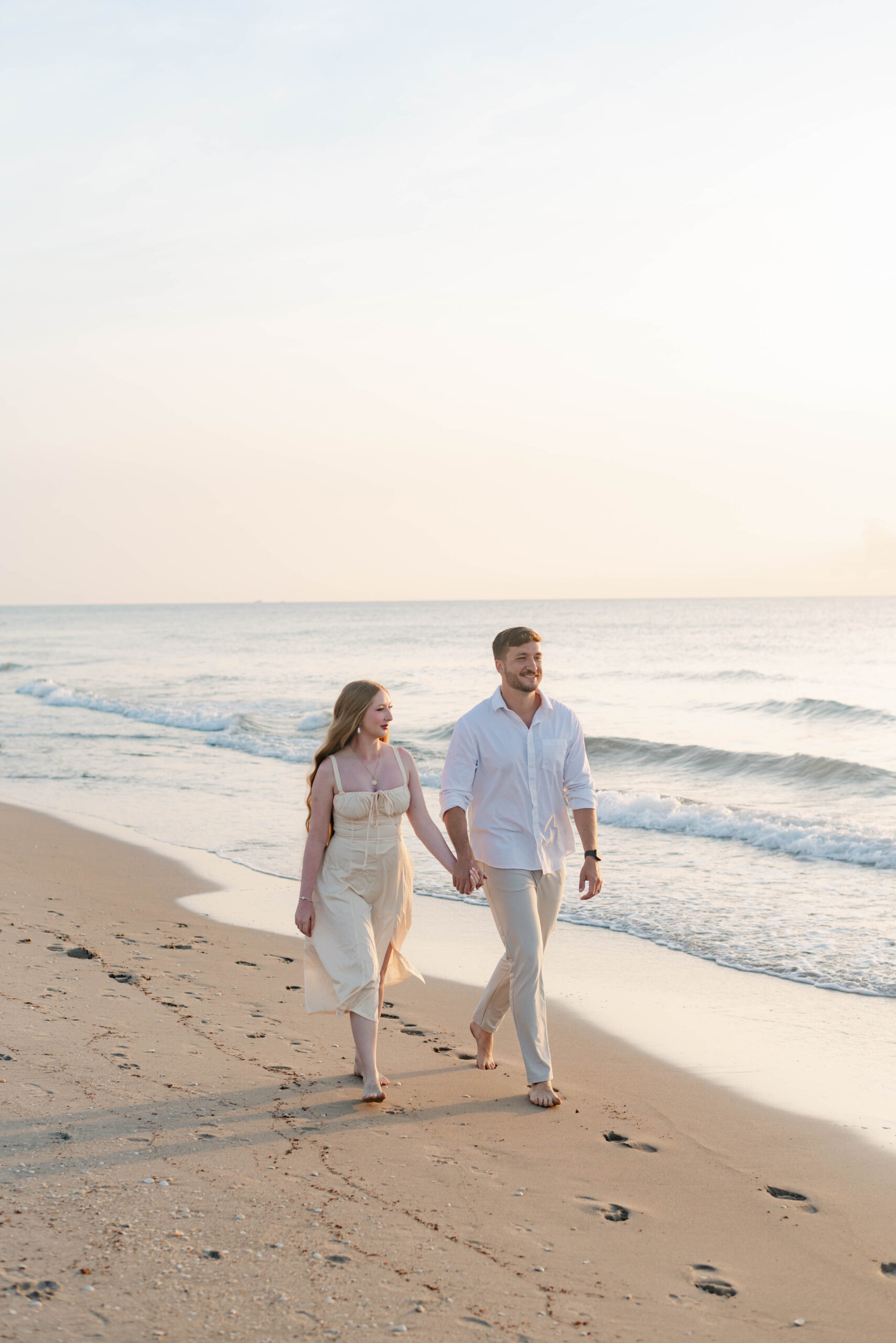 Romantic Palm Beach Island beach engagement session during golden hour