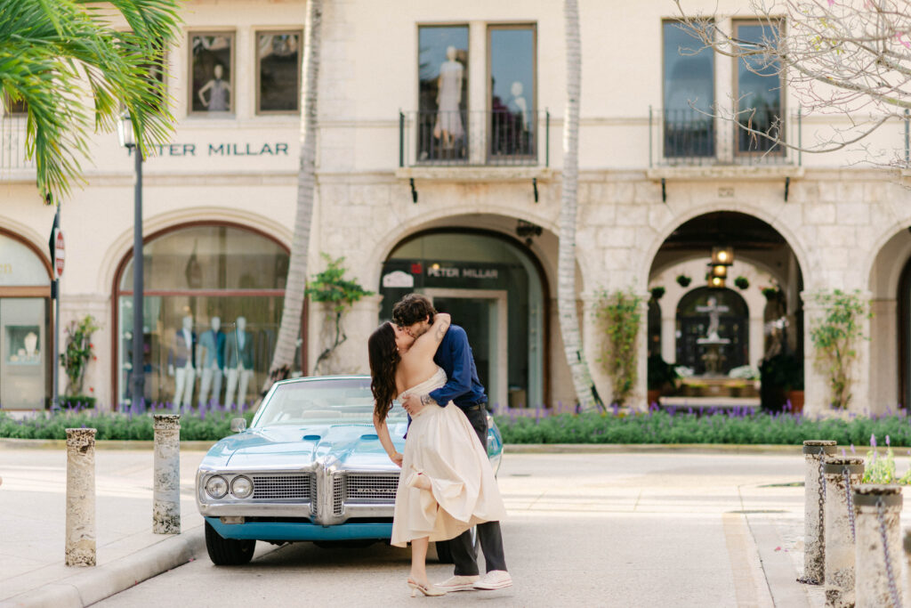 Couple kissing at golden hour with pastel tones