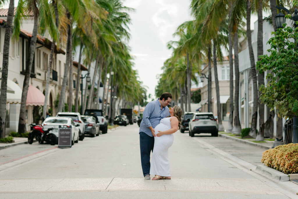 South Florida couple embracing during Palm Beach maternity session