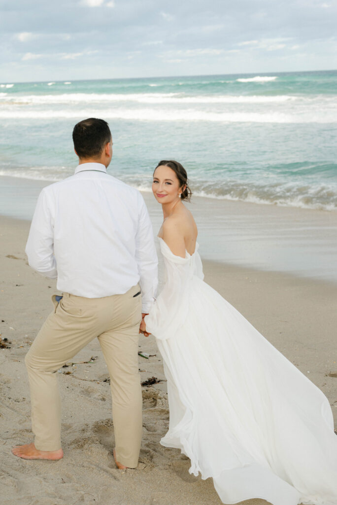 Sunlight hitting couple’s faces during sunset portraits