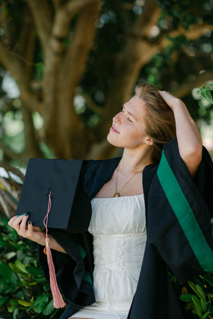 Sunlit portrait of graduate in Palm Beach