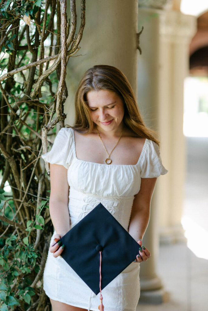 White mini dress graduation photo in South Florida outdoor location