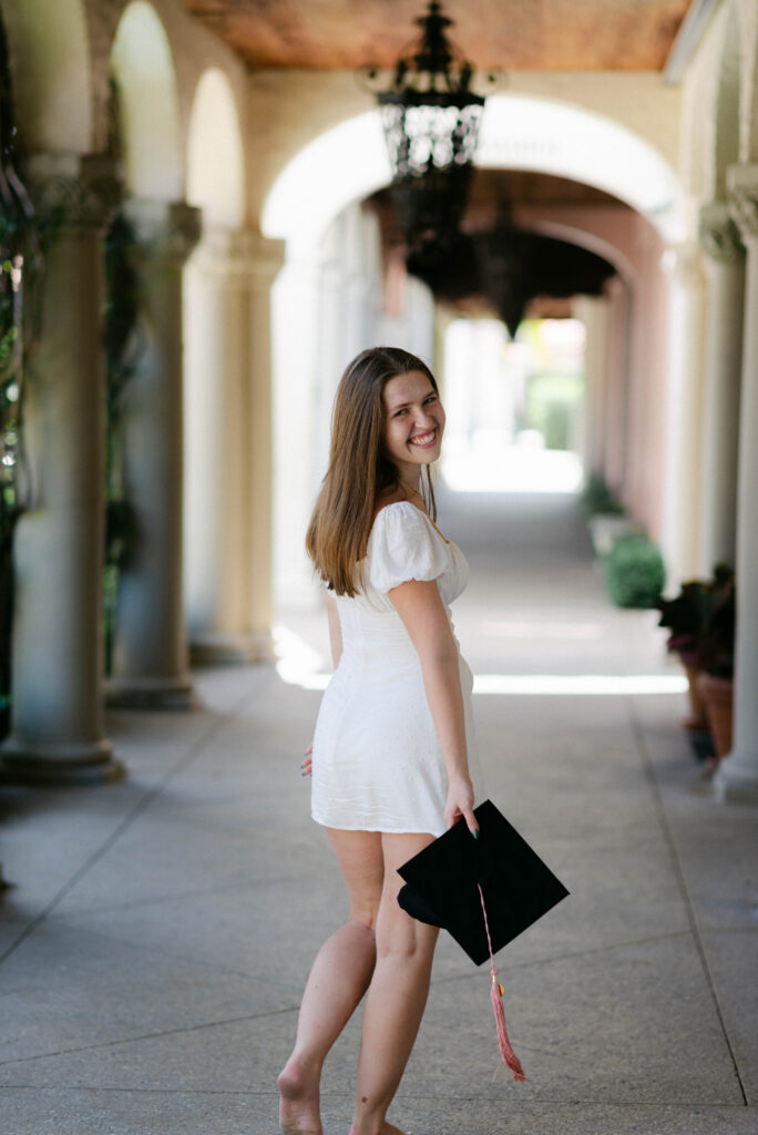 Palm Beach grad walking barefoot down Worth Avenue
