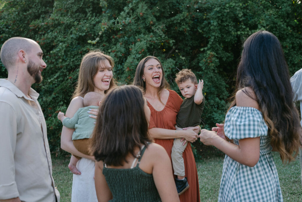 Candid family reactions during surprise proposal photographed by Ocala family photographer