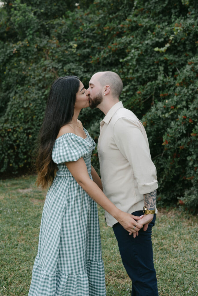 Couple embracing after engagement during backyard session in Ocala Florida