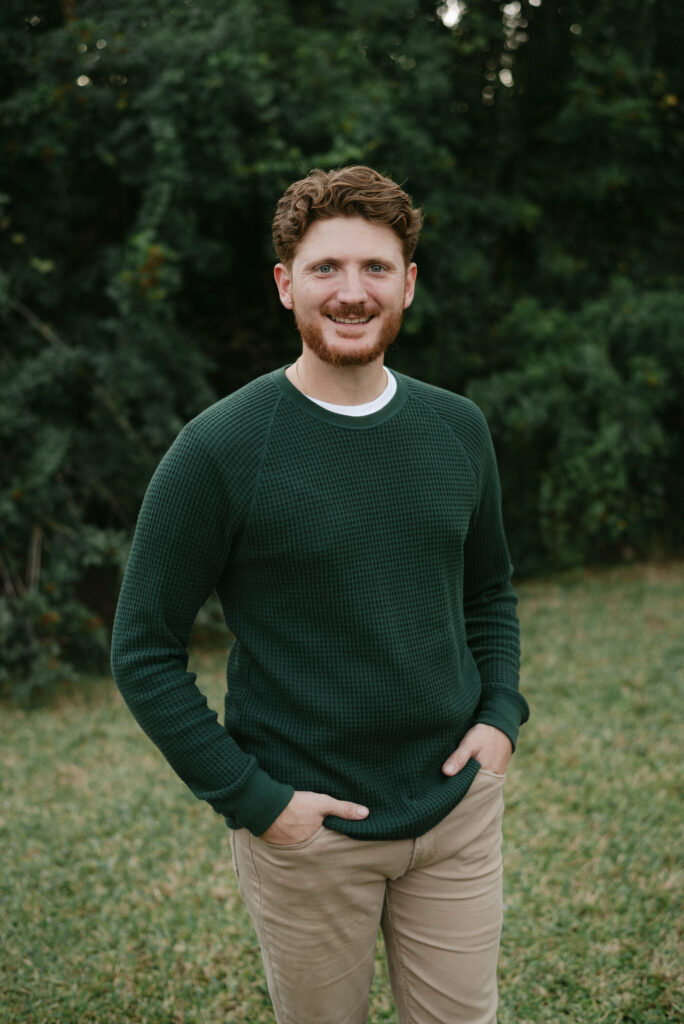 Smiling husband, Ocala wedding photographer and videographer team