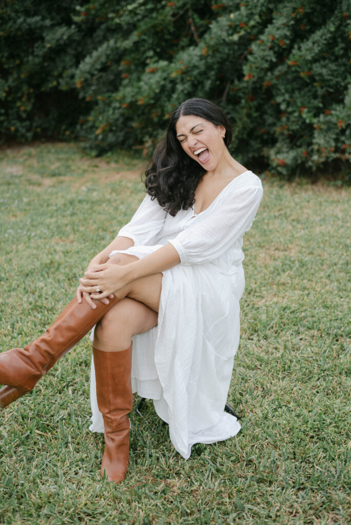 Amy smiling while preparing for a family session, Ocala photographers capturing candid moments