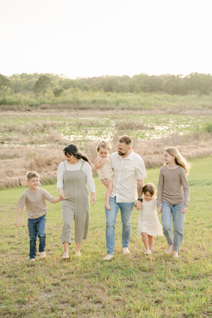 Ocala family photographer candid family session at sunset