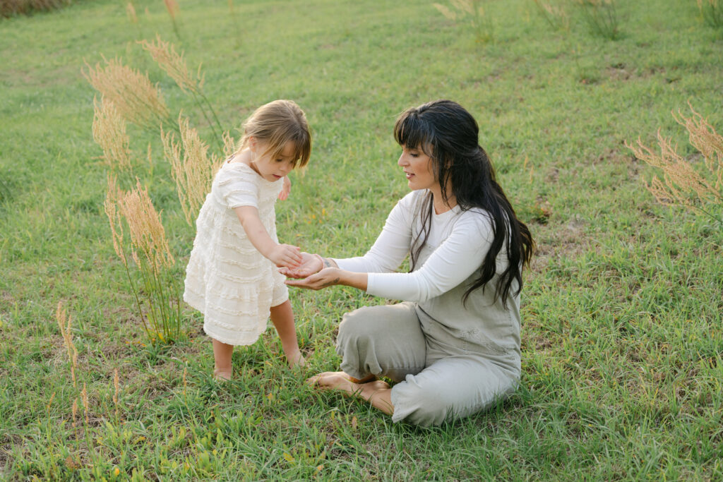 natural moment between mother and daughter during family photos