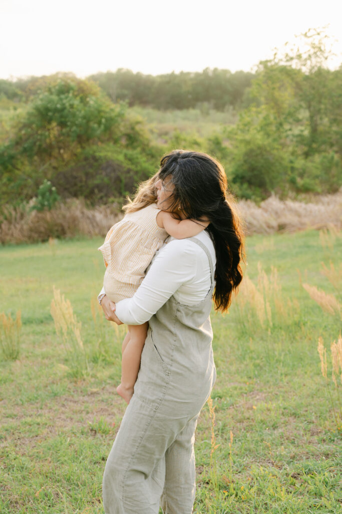 golden hour sunset photo of mother and daughter